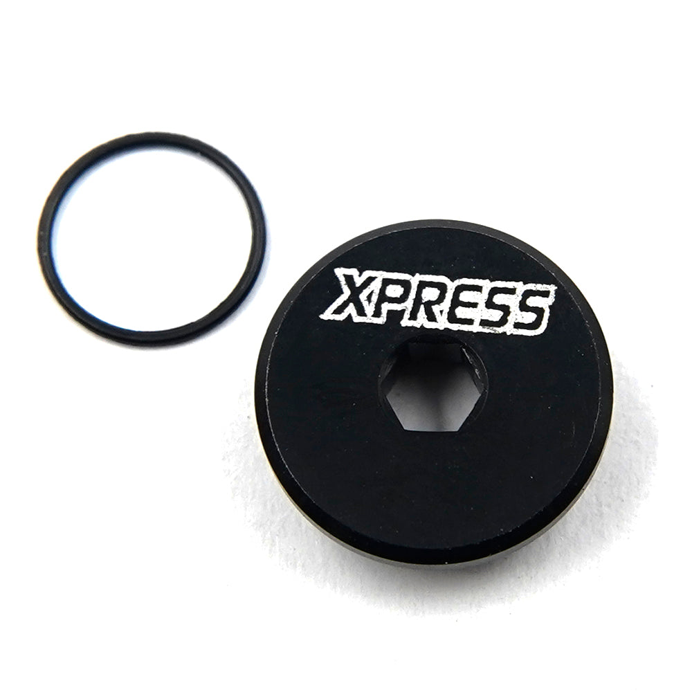 Xpress Center Pulley Adaptor Cap, black plastic fitting for machinery or equipment, shown on a white background.