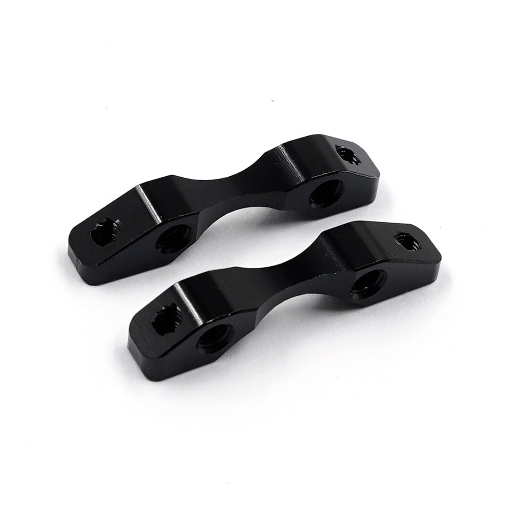 Xpress aluminum suspension mounts for graphite lower arms, shown in black with mounting holes for vehicle suspension setup.