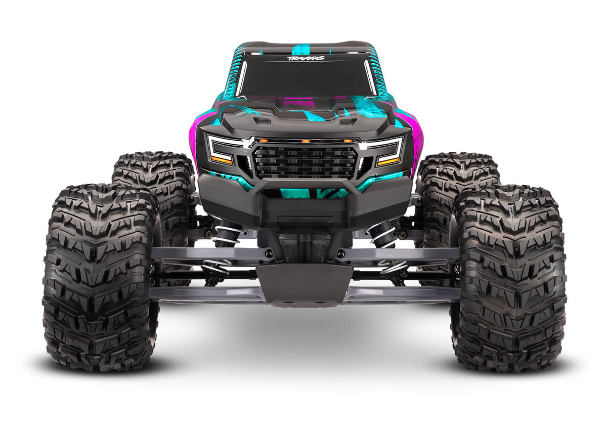 Traxxas Stampede 2WD Brushless RC truck with pink body, front view showing rugged tires and detailed design.