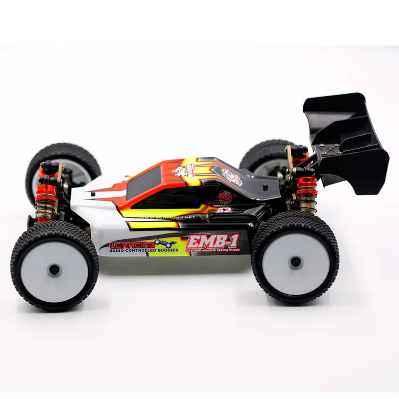 LC Racing EMB-1 1/14 scale 4WD RC buggy with detailed body and off-road tires, ready for off-road racing.