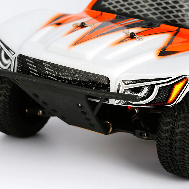 LC Racing EMB-SC 1/14 scale 4WD short course truck with detailed body, off-road tires, and racing features in a vibrant design.