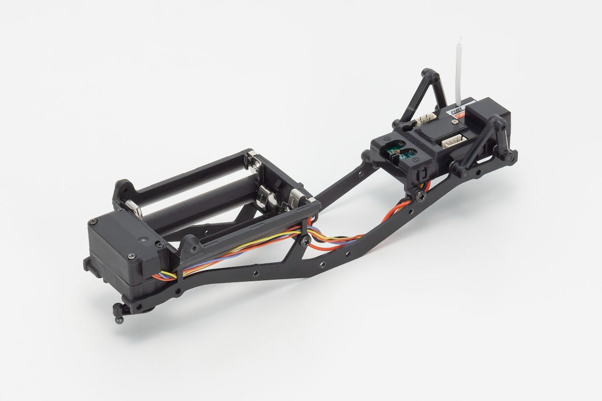 Kyosho Mini-Z MX-01 4x4 Land Rover Defender 90 RC car chassis in gray and black with detailed design.