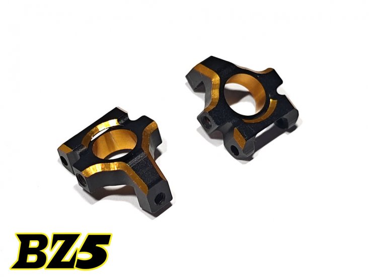 Pair of Atomic RC BZ5 rear uprights for RC cars, showing the black plastic components with mounting holes.
