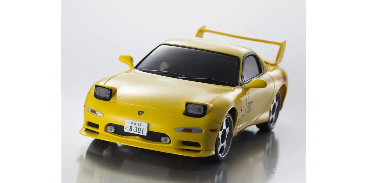 Kyosho First Mini-Z Initial D Mazda RX-7 FD3S Keisuke Takahashi RC car parts, detailed miniature model on display.