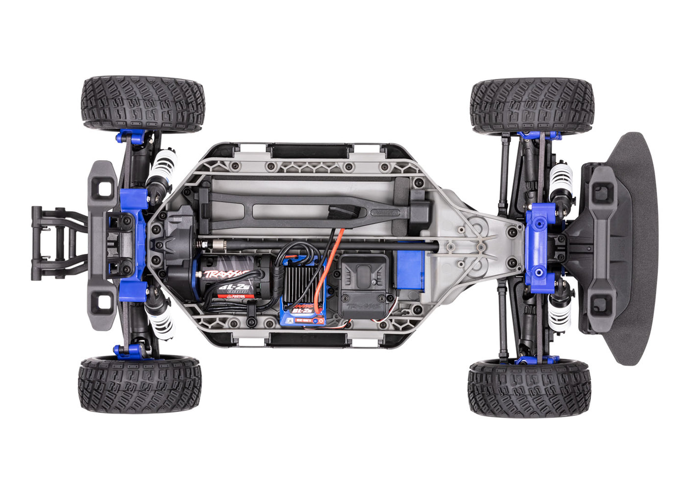 Traxxas Ford Fiesta ST Rally BL-2s remote control car with top chassis view, showcasing detailed rally car design and features