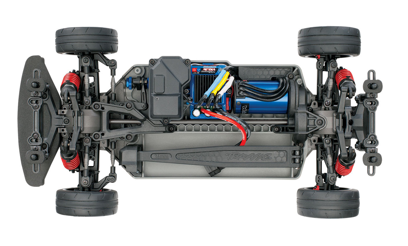 Overhead view of Traxxas 4-Tec 2.0 VXL chassis showing the detailed plastic frame and mounting points for RC car assembly.