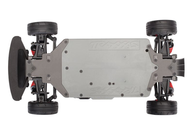 Traxxas 4-Tec 2.0 BL-2s chassis bottom view showing the lightweight, detailed plastic construction with mounting points.