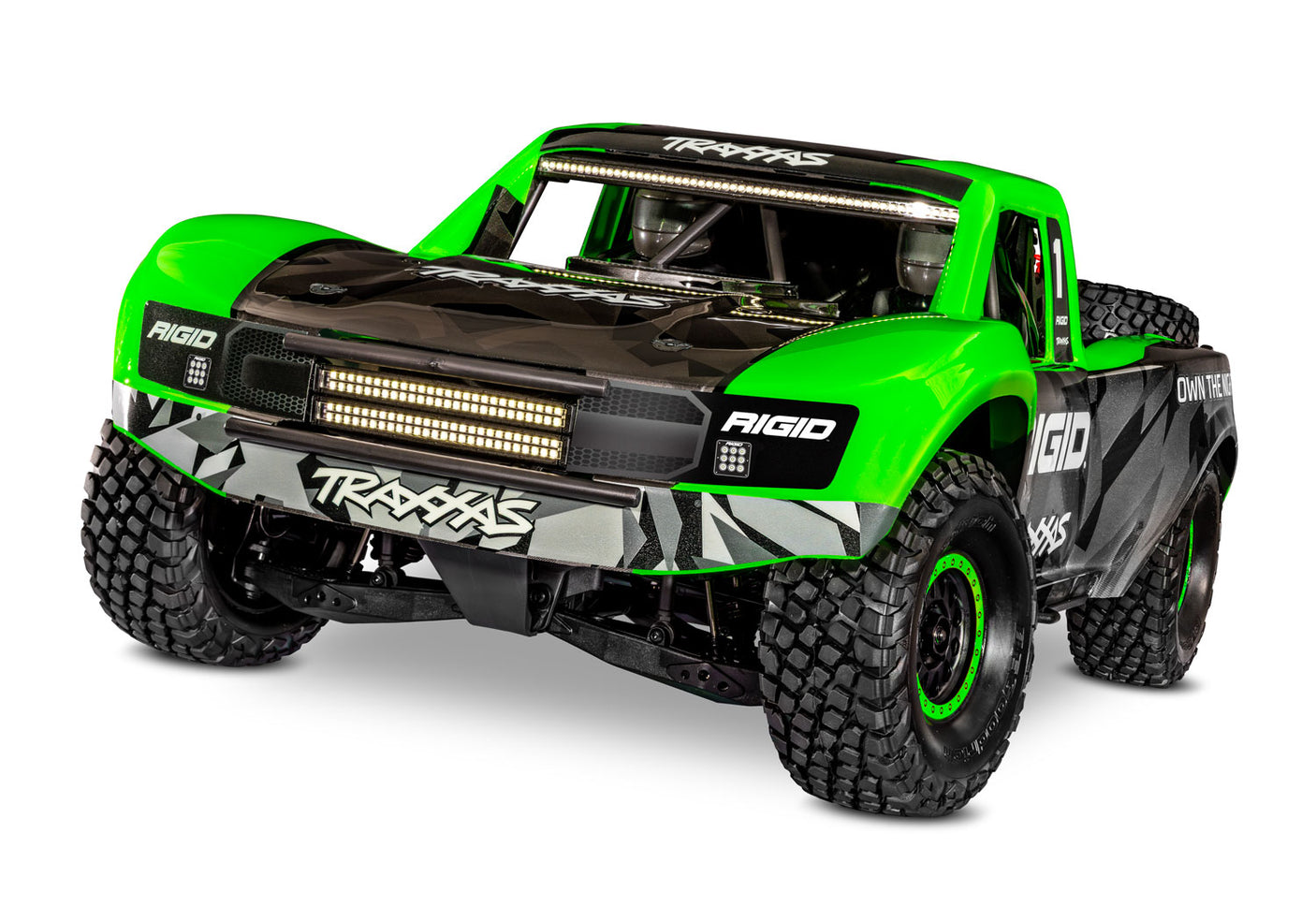 Traxxas Unlimited Desert Racer RC truck with green body, front view showing rugged tires and detailed chassis.