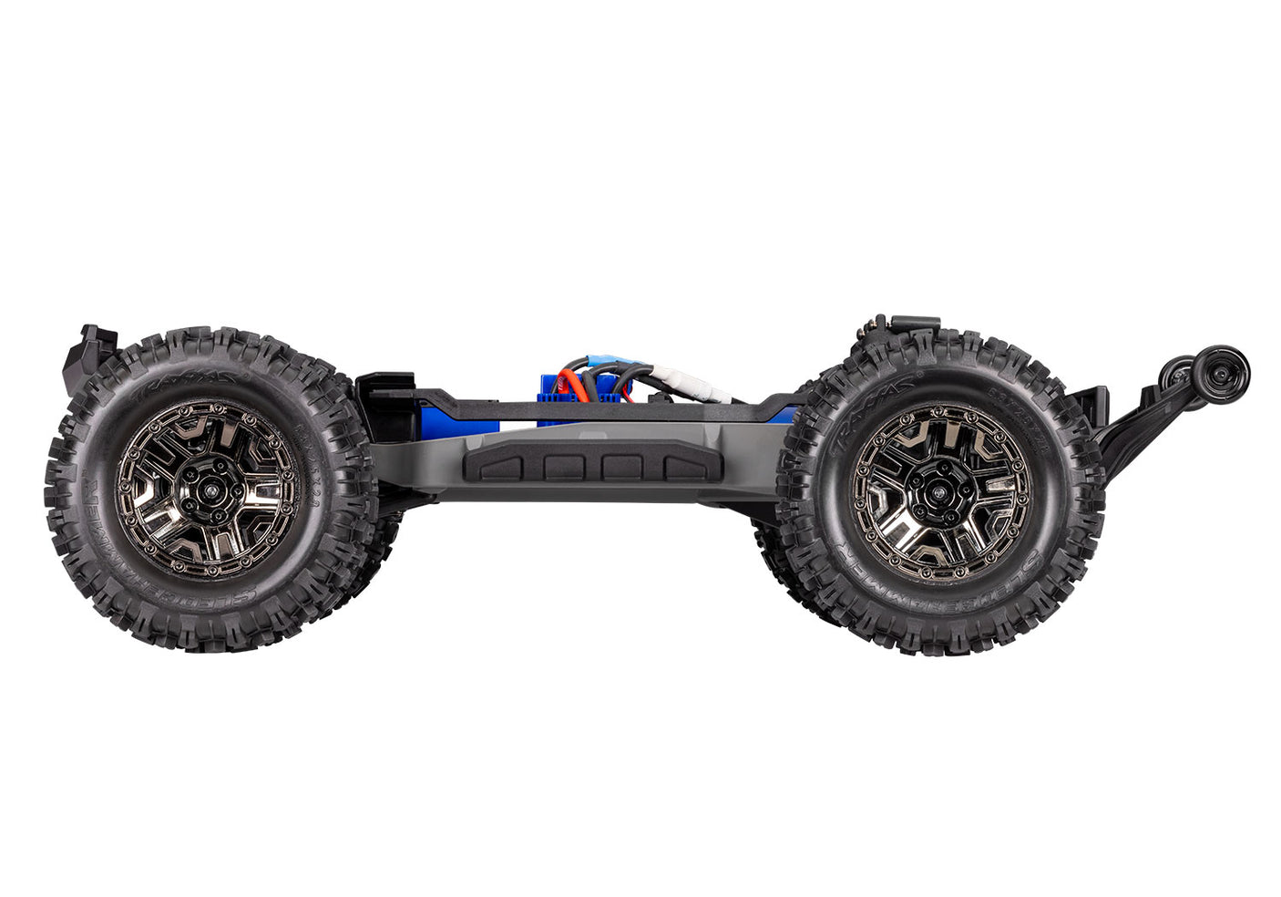 Side view of the Traxxas Stampede 4X4 VXL RC truck chassis showing suspension and drivetrain components.