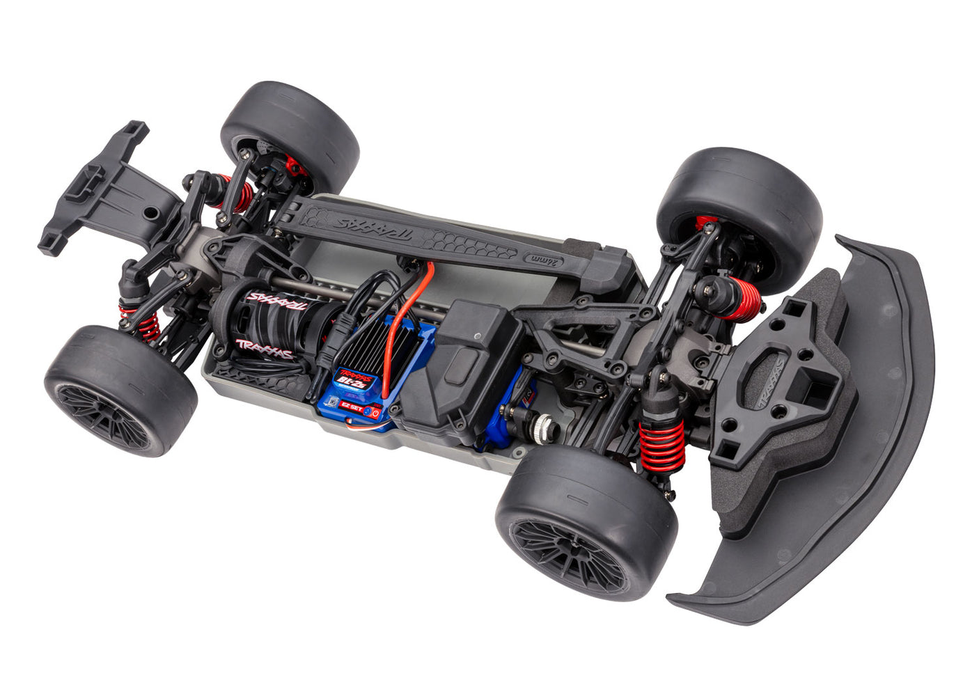 Traxxas 4-Tec 3.0 Toyota Supra BL-2s RC car chassis with RGB lighting, shown from a three-quarter rear angle.