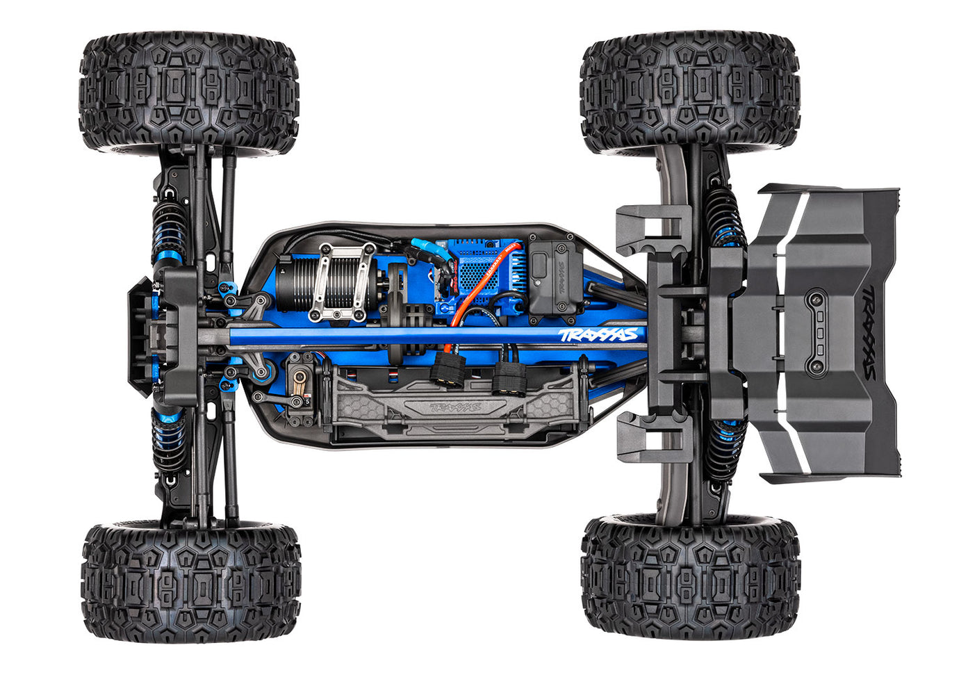 Traxxas 1/8 Sledge belted RC truck chassis viewed from above showing detailed structure and components.