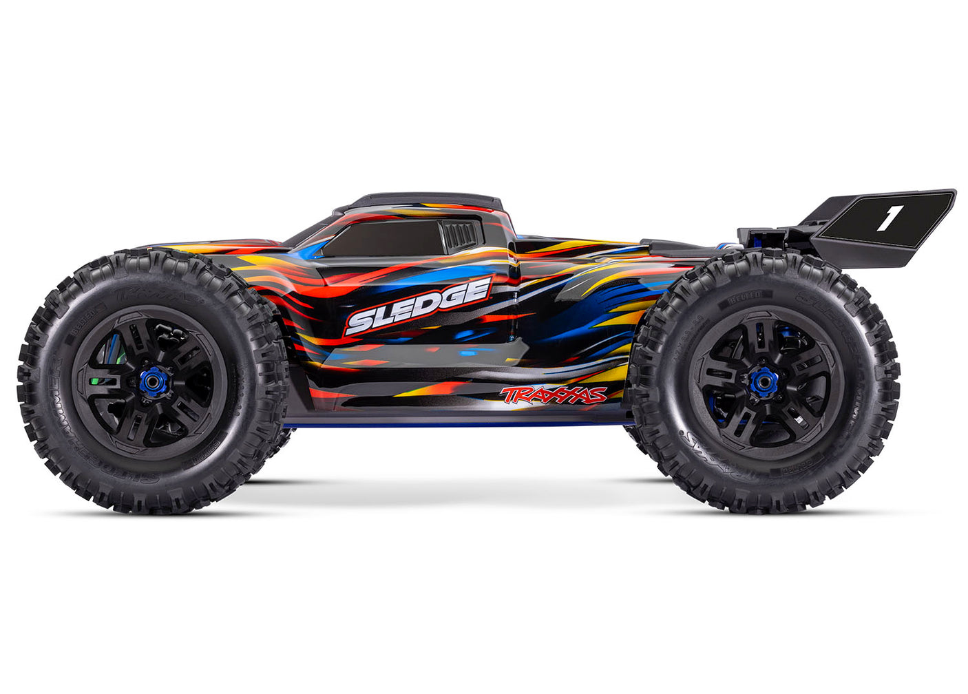 Traxxas 1/8 Sledge belted RC truck with blue accents and rugged tires, shown from the side view.