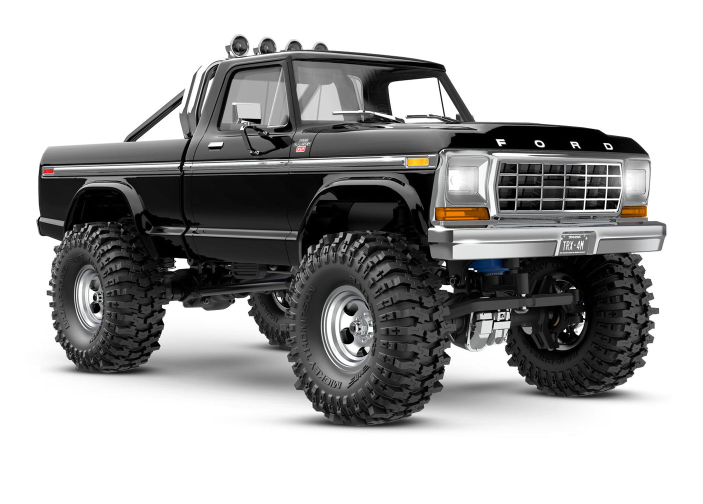 Traxxas TRX-4M 1/18 Ford F-150 High Trail Edition RC truck front three-quarter view in black with detailed exterior features.