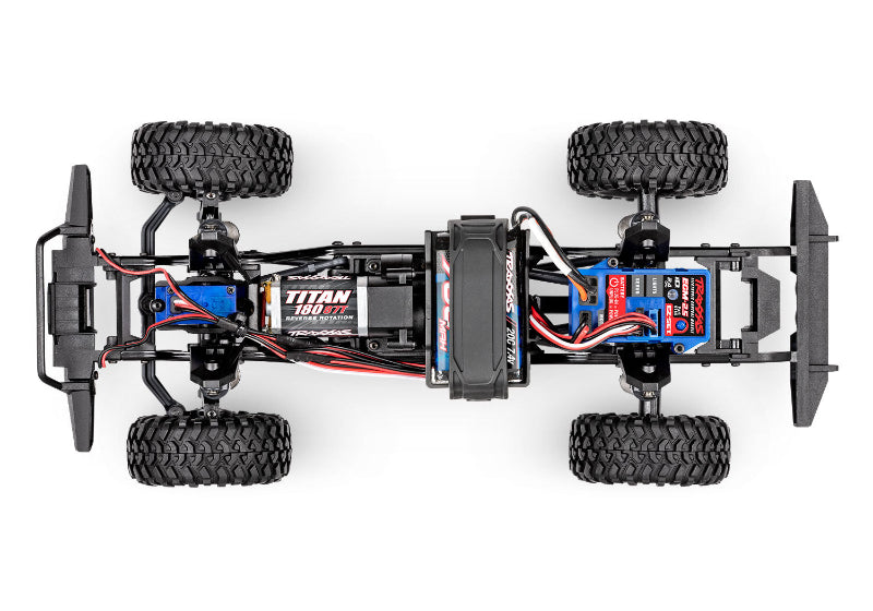 Overhead view of the Traxxas TRX-4M Land Rover Defender RC truck chassis showing detailed components and design features.