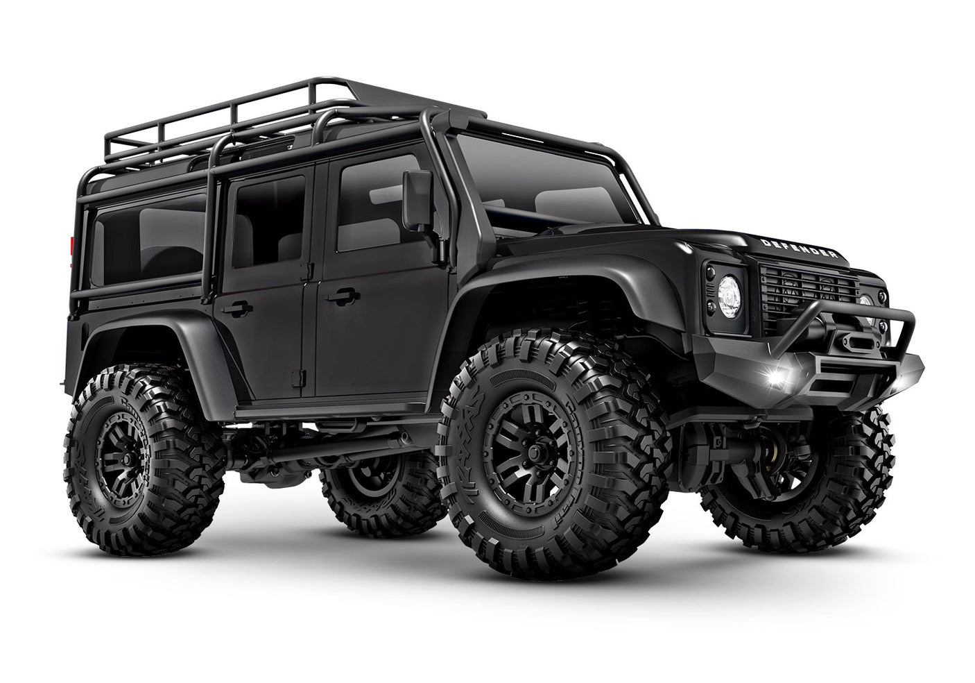 Traxxas TRX-4M Land Rover Defender RC scale model vehicle, front three-quarter view with detailed black exterior.