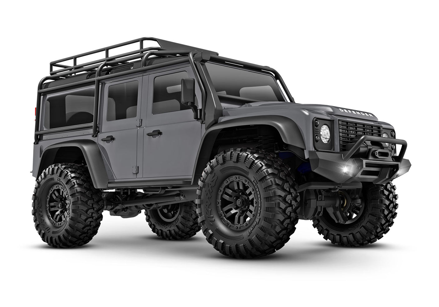 Traxxas TRX-4M Land Rover Defender radio-controlled scale model showing three-quarter front view with silver body.