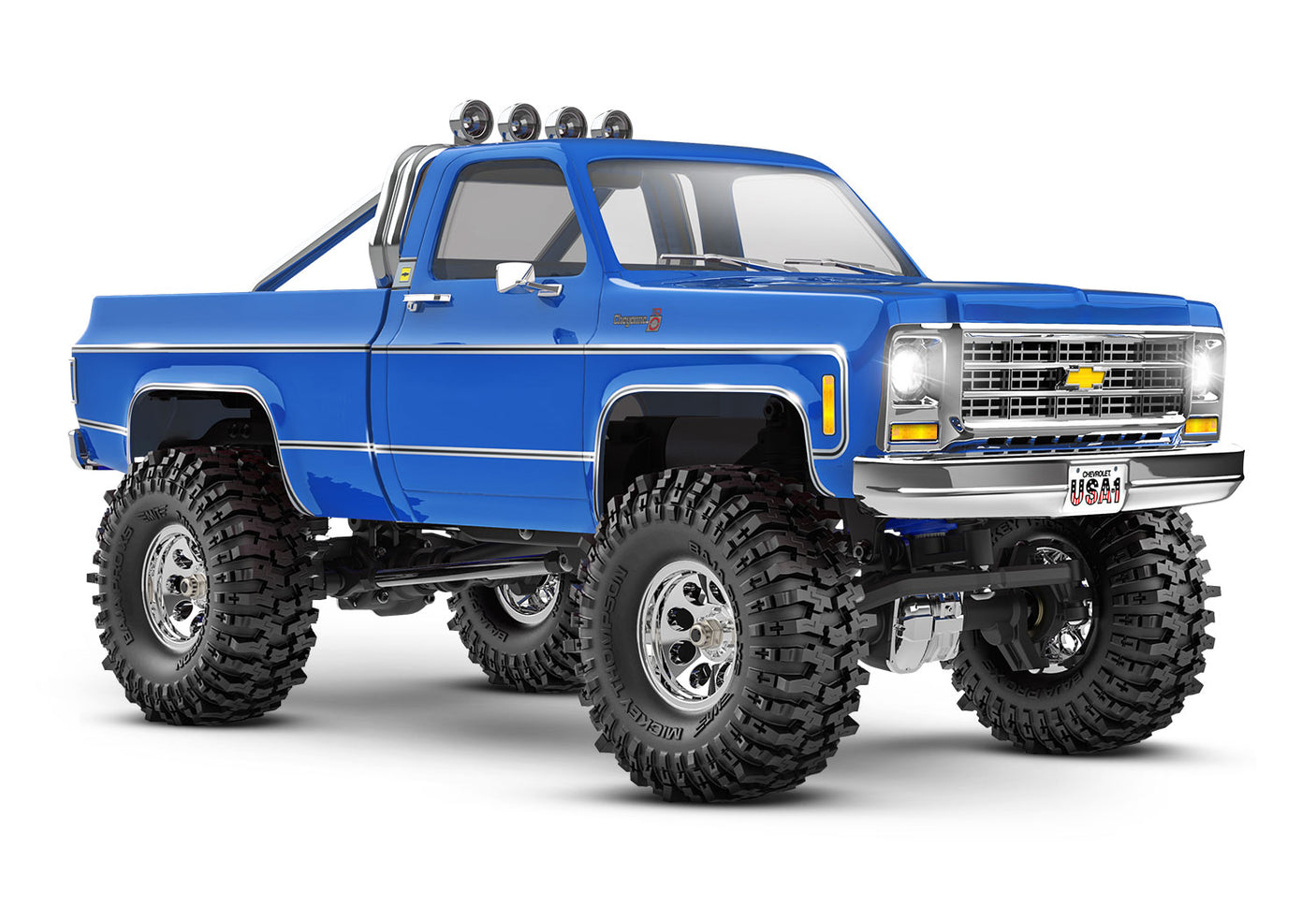 Traxxas TRX-4M 1/18 Chevrolet K10 High Trail Edition remote control truck, blue front three-quarter view.