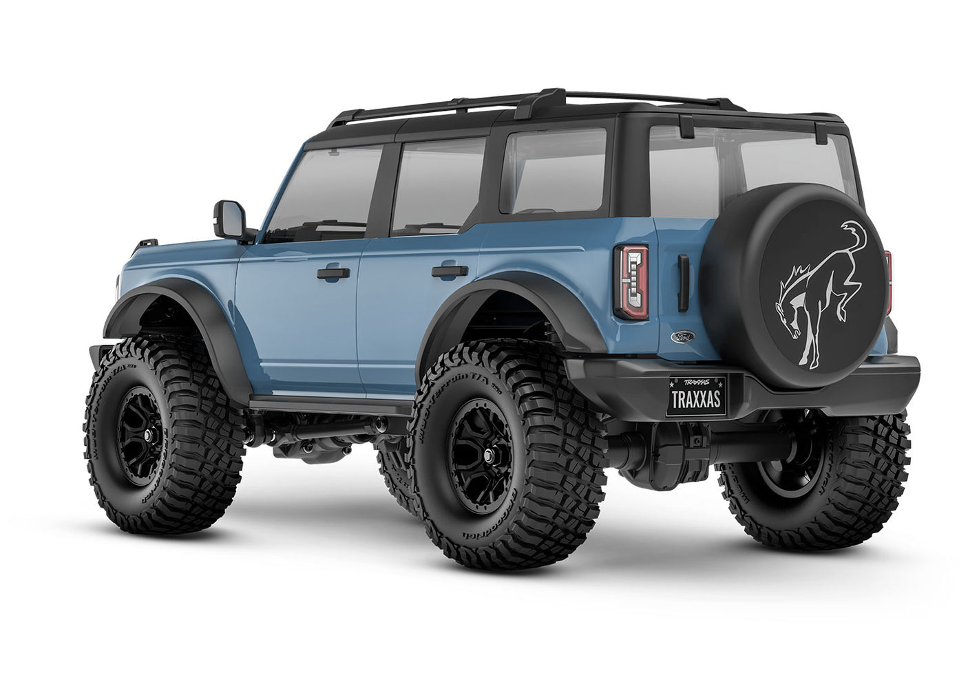 Rear view of the Traxxas TRX-4M Ford Bronco RC truck showing detailed body and off-road tires from a three-quarter angle.