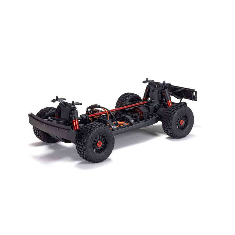 ARRMA 1/8 Mojave 4S 4x4 RTR desert truck, detailed orange and black off-road RC vehicle with rugged tires and suspension.