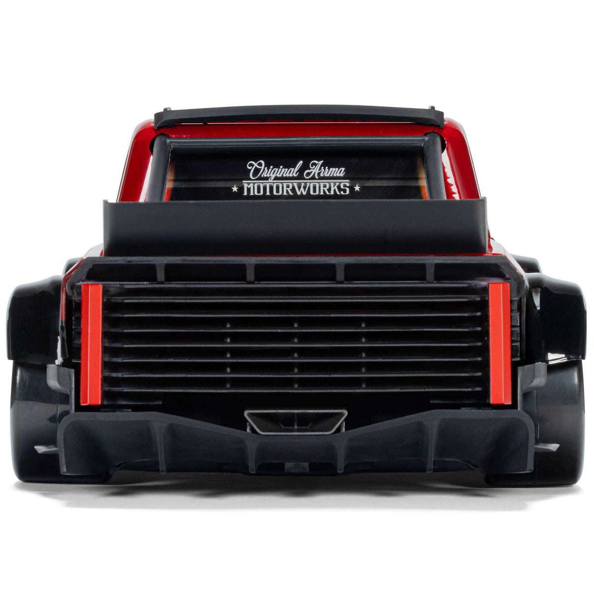 ARRMA 1/12 Infraction GROM 3S BLX 4x4 brushless street truck with battery and charger, shown on a smooth surface.