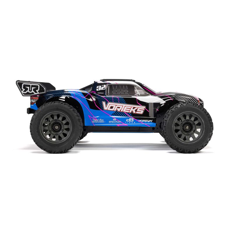 ARRMA 1/10 VORTEKS 2WD brushed stadium truck in blue, featuring a durable chassis and off-road tires ready for racing.