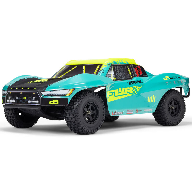 ARRMA 1/10 Fury 223S DSC 2WD RTR brushless short course truck on a track, showcasing its sleek design and off-road tires.