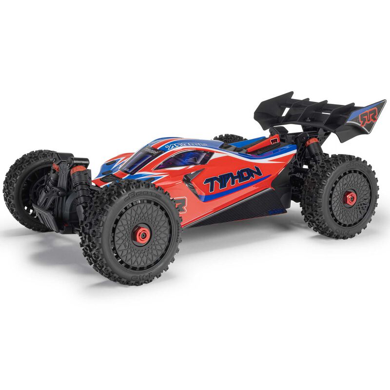ARRMA 1/8 Typhon 4x4 RTR brushed buggy on rugged terrain, showcasing its powerful off-road design and vibrant orange and black body.