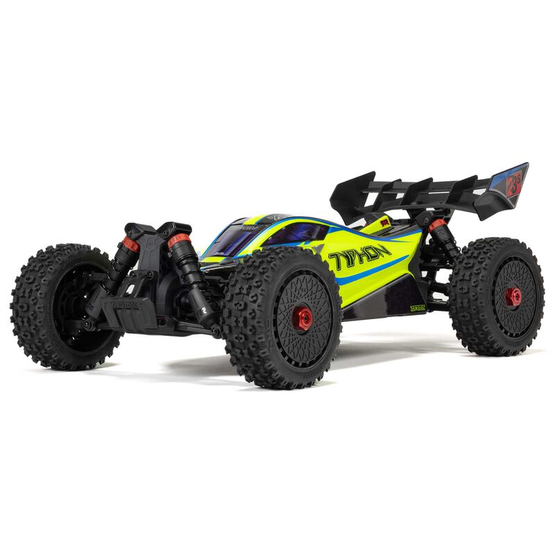 ARRMA 1/8 Typhon 223S DSC 4x4 RTR brushless buggy on rugged terrain, showcasing its sporty design and off-road capabilities.