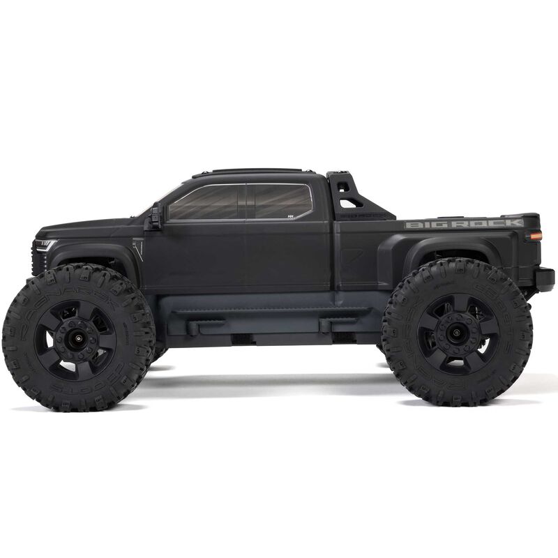 ARRMA 1/10 scale Big Rock 223S DSC 4x4 RTR brushless monster truck on rugged terrain, showcasing its powerful off-road design