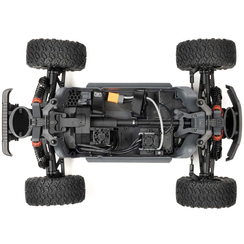 ARRMA 1/10 scale Big Rock 223S DSC 4x4 RTR brushless monster truck on rugged terrain, showcasing its durable design and powerful build.