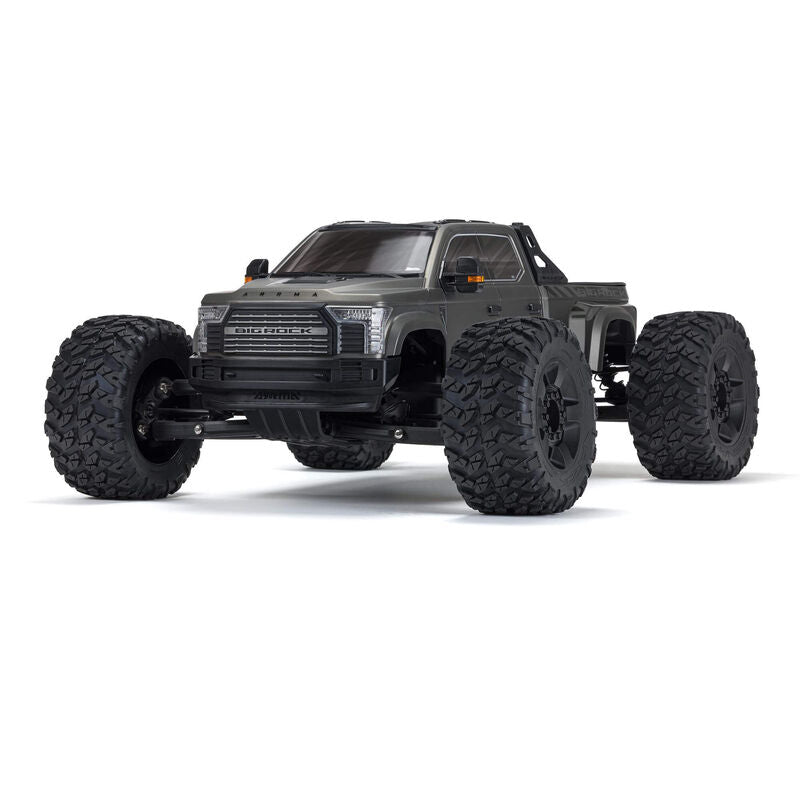 ARRMA 1/7 Big Rock 6S 4WD BLX RTR monster truck shown on rugged terrain with large tires and powerful suspension.