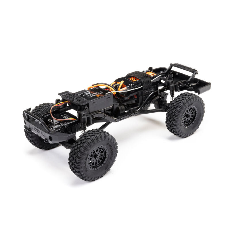 Axial 1/24 SCX24 Base Camp 4x4 RTR brushed rock crawler with detailed exterior and rugged tires, ready for off-road adventures.