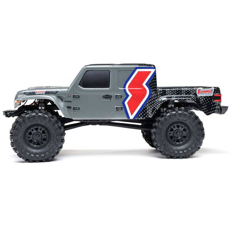 Axial SCX24 Summit Racing Jeep Gladiator 4x4 rock crawler RTR shown with detailed exterior and rugged off-road tires.
