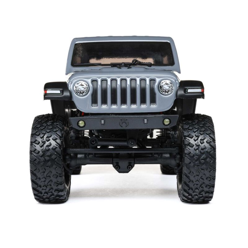 Axial 1/24 scale SCX24 2019 Jeep Wrangler JLU CRC 4X4 brushed rock crawler on rugged terrain