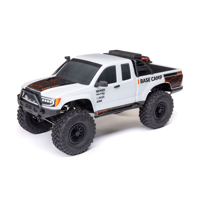 Axial 1/10 SCX10 III Base Camp 4x4 RTR brushed rock crawler in white with off-road tires and detailed chassis.