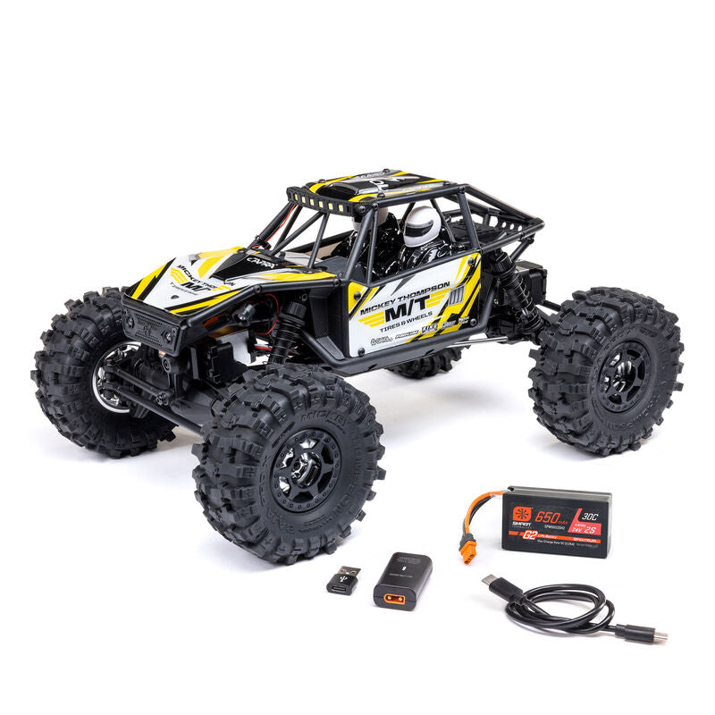 Axial 1/18 UTB18 Capra 4WS 4X4 RTR brushed rock crawler with detailed chassis and off-road tires.