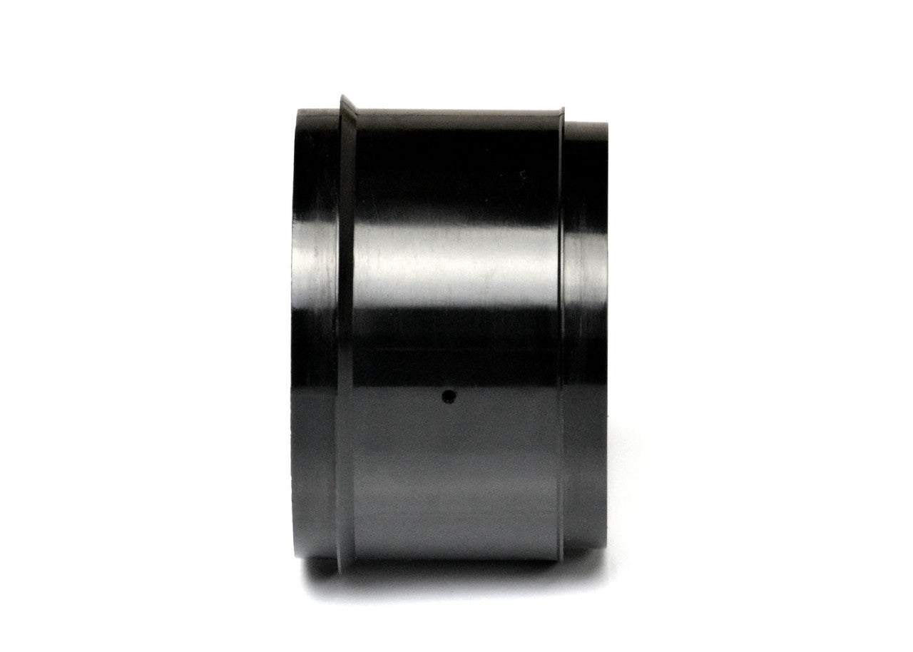 Pair of Exotek Racing F1 1/10 front disk wheels for RC car, showcasing detailed black plastic rims and tire mounting surface.