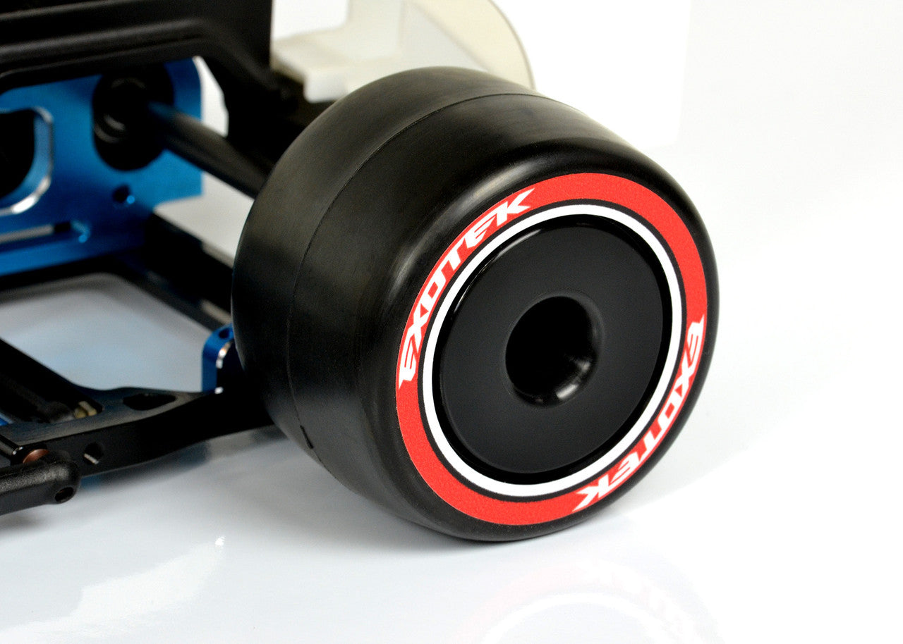 Exotek Racing F1 1/10 rear rubber tires, soft red compound for RC car racing, shown with tread pattern and sidewall details.