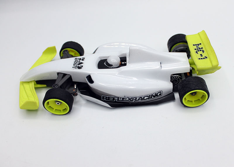 Red Reflex Racing FX28 Formula RC car kit with detailed body and racing decals, ready for high-speed remote control racing.