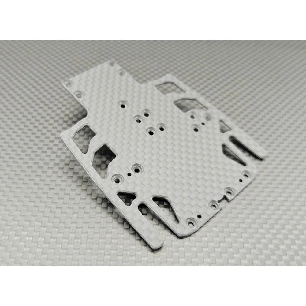 Wide carbon chassis for LMP2 race car by GL Racing, showing sleek aerodynamic design and lightweight construction.