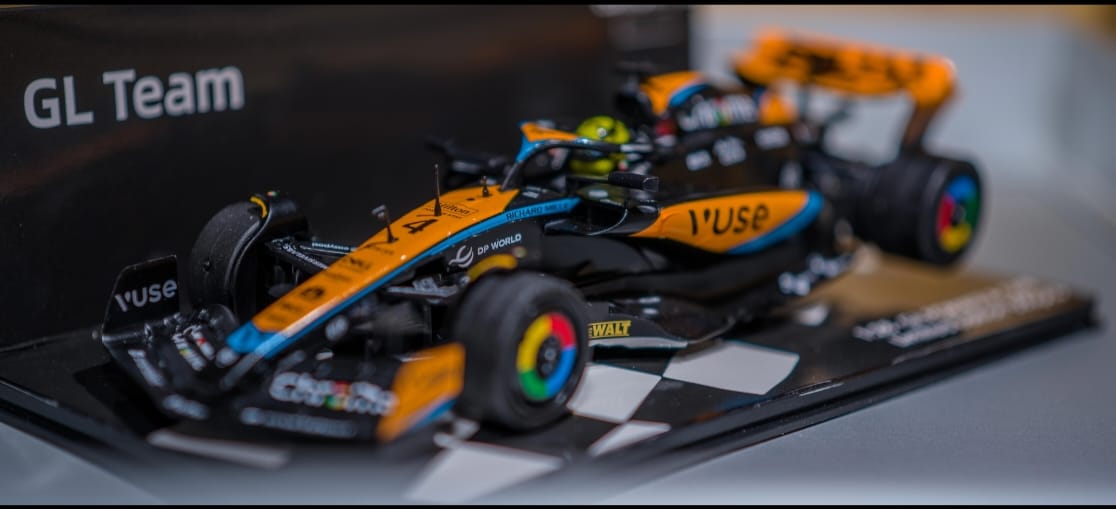Detail of a GL Racing 1/28 scale Formula One chassis model showing intricate racing car design and construction.