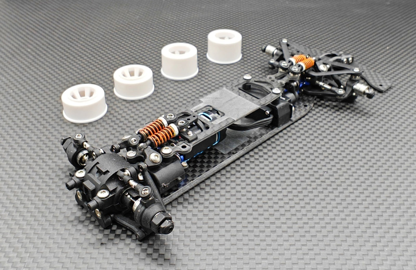 GL Racing 1/28 scale Formula One chassis model showing detailed design and construction of the miniature racing car frame.