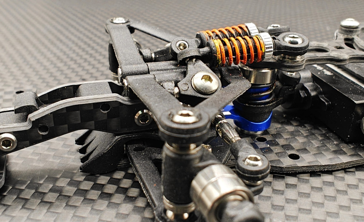 Rear view of GL Racing 1/28 scale Formula One chassis, showcasing detailed racing car frame and aerodynamic features.