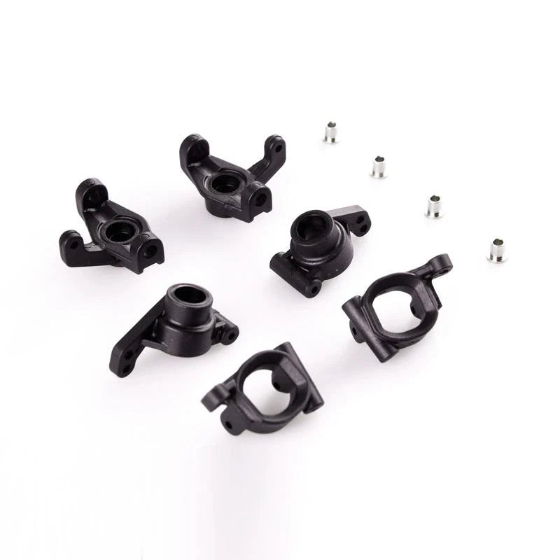 LC Racing L6007 steering block, C-hub, and upright set with metal components and precise machining for RC car suspension.