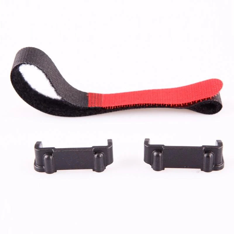 LC Racing L6008 EMB battery mount set showing black plastic brackets and mounting hardware for RC car batteries.