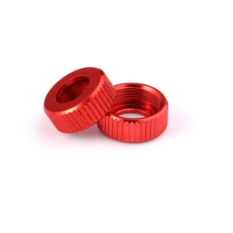 Aluminum lower shock caps for LC Racing L6114, featuring a sleek metallic finish and precise fit for remote control car shocks.