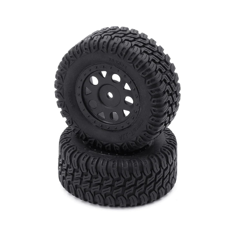 Pair of LC Racing L6268 short course truck tires with textured rubber treads and black sidewalls for off-road RC racing.