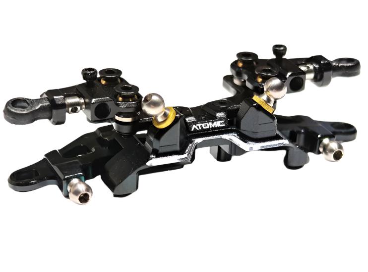 Atomic RC MRX double wishbone suspension conversion kit with detailed components and assembly parts for RC car upgrade.