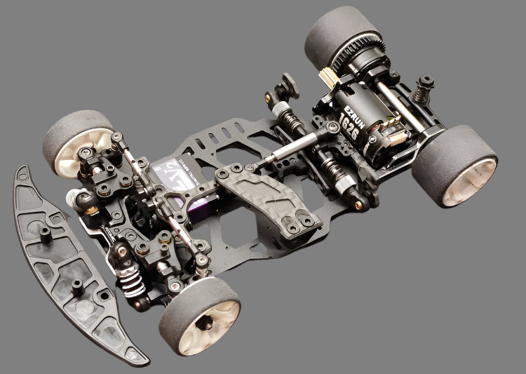 Atomic RC MRX Master Edition 2WD RC car chassis with sleek black design and detailed components for high-performance racing.