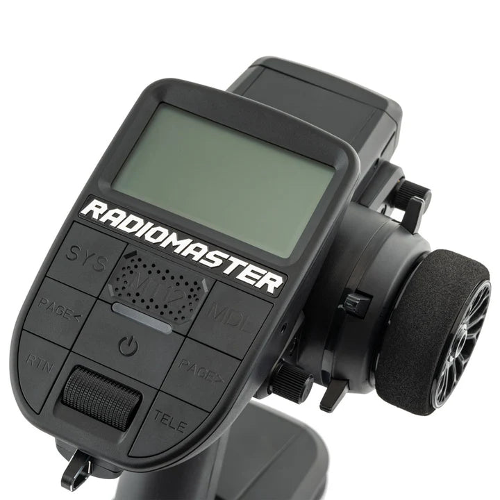 RadioMaster MT12 Surface Radio Controller with ergonomic design, multiple control sticks, and adjustable switches for RC drone flying.